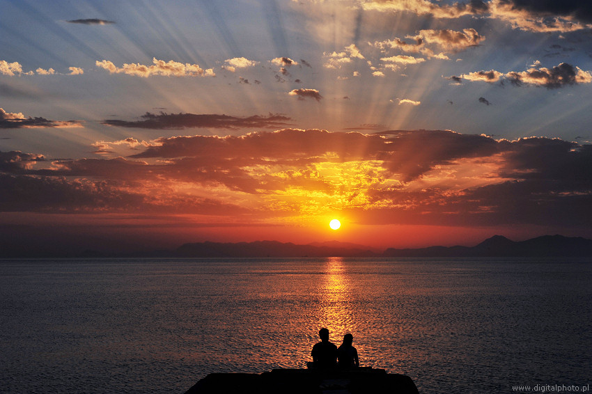 Romantiska bilder, man och kvinna, solnedgång
