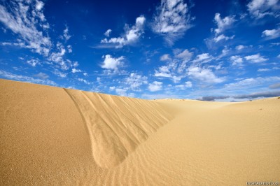 Sanddynene, skyer og himmel